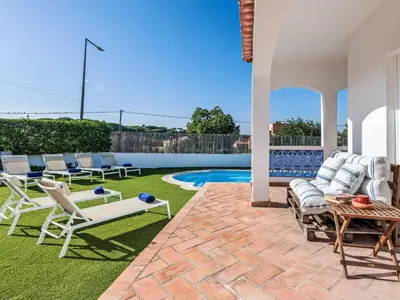 a patio with lawn furniture and a swimming pool at Holiday Home Antonica by Interhome in Patroves
