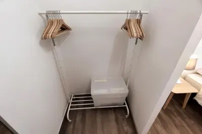 a room with a closet with a toilet in it at Sea View Apartment Faro in Faro
