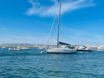 a group of boats sitting in the water at Marimar Sea View Apartment Faro in Faro
