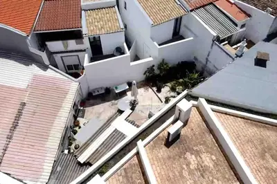 an overhead view of a house with roofs at Faro old town cosy typical house in Faro