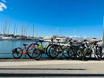 a row of bikes parked next to a marina at Vilamoura Beach Villa by nature with Olympic Pool in Quarteira