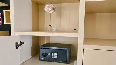 a kitchen with a microwave oven in a cabinet at MouraSuites CD 601 - Cleverdetails in Vilamoura