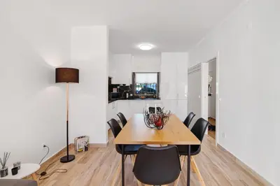 a dining room with a table and chairs at Apartment Zeza in Albufeira