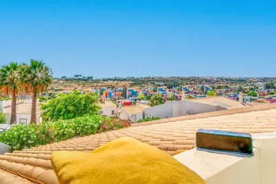 a view of the city from the roof of a building at Villa Garbino in Albufeira