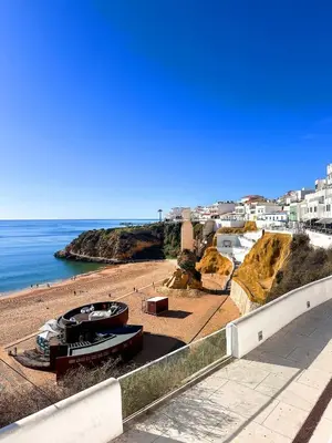 a view of a beach with buildings and the ocean at OceanView Apartment by BeCherish in Albufeira