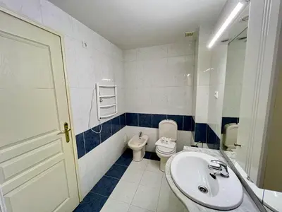 a bathroom with a sink and a toilet at Albufeira Central 9 by Homing in Albufeira