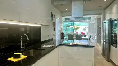 a kitchen with a sink and a counter top at Lua by Check-in Portugal in Albufeira