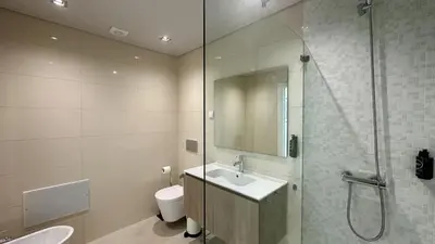 a bathroom with a sink and a shower and a toilet at Lua by Check-in Portugal in Albufeira