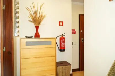 a room with a fire extinguisheracistacistacistacist at Sacada Apartment in Guia