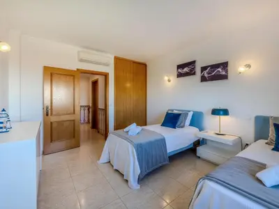 a bathroom with a sink and a mirror at Apartment Valmangude Sunny Escape - VIP Properties by Interhome in Albufeira