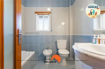three bottles of hand sanitizer sitting on a counter at #190 Families Only - Descobrimentos by Home Holidays in Albufeira