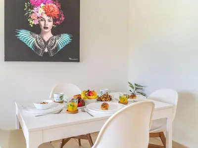 a white table with breakfast foods on it at Villa Vilamoura NATURE GREEN GOLF AND POOL in Quarteira