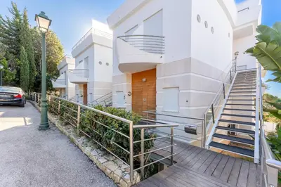 a building with a staircase and a street light at Apartment Atlantic - Vale de Lobo in Almancil