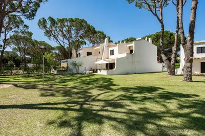 a view of the house from the yard at Vilamouratenis Sunscape by SAPvillas in Vilamoura