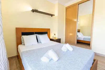a house with a balcony with a dining room at #039 Family Private Pool AC in Albufeira