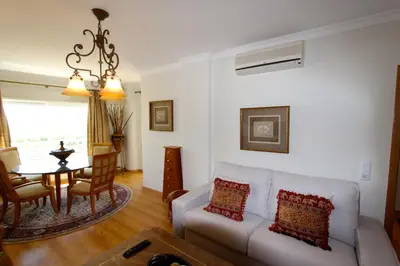 a living room with a couch and a table at Antelius 82 - Clever Details in Vilamoura