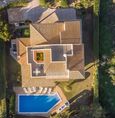 an overhead view of a house with a swimming pool at Villa Andrea in Albufeira