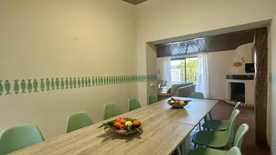 a room with a table with a bowl of fruit on it at Vilanova by Check-in Portugal in Albufeira