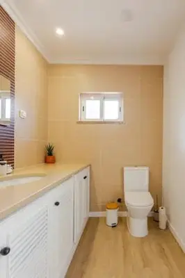 a bathroom with a toilet and a sink at BrisaMarVilas Sea view, 5 min Walk to Town & Beach 12e13 in Albufeira