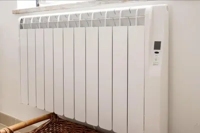 a bathroom with a sink and a shower with a mirror at Sunny 3-Bedroom Apartment in Albufeira