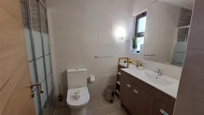a bathroom with a toilet and a sink at SÃO RAFAEL BEACH Apartment 55 in Albufeira