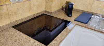 a microwave sitting on top of a kitchen counter at Albufeira View Sea Apartment Luxury in Albufeira