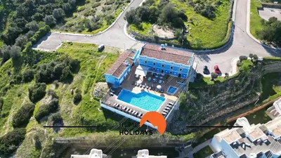 an aerial view of a house with a swimming pool at #279 T2 Para Relaxar em Albufeira by Home Holidays in Albufeira