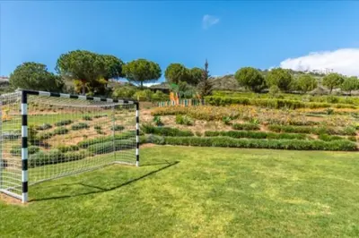 a net in the middle of a field of grass at Albufeira Marina Gardens AO in Albufeira