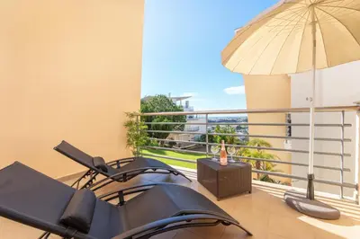 an aerial view of a apartment complex with a swimming pool at BnB Homes White Rose Garden Apartment with 2 Terraces & 2 Swimming Pools in Albufeira