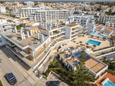 an aerial view of a building in a city at Varandas do Mar, Olhos de Agua, 1 Bed Apt AT23 in Olhos de Água