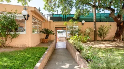 a building with a walkway in front of it at Balaia Project by LovelyStay in Olhos de Água
