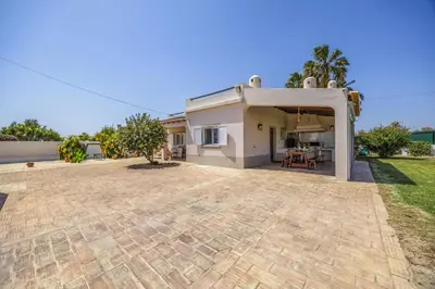 a house with a large driveway in front of it at Villa Domus Vini by Villa Plus in Guia
