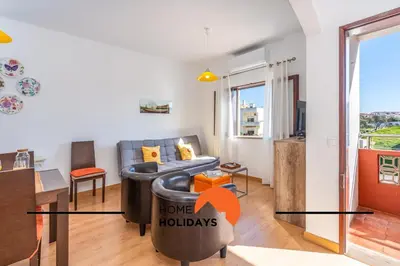 a living room with a couch and a table at #242 Old Town - Casa de Albufeira 2 by Home Holidays in Albufeira