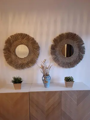 two mirrors on a wall with potted plants on a counter at Marina 3B 1B By AL in Albufeira
