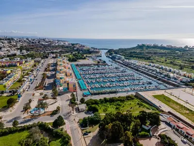 an aerial view of a large parking lot with boats at Marina 4B 1D By RS in Albufeira