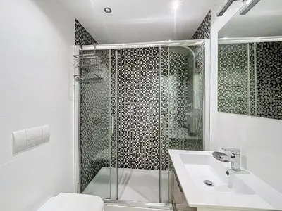 a bathroom with a shower and a toilet and a sink at Paradise Near Old Town in Albufeira