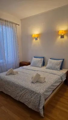 a bedroom with a bed with two towels on it at Sweet Dreams in Albufeira