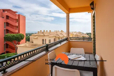 a balcony with a table and chairs and a view at #274 T3 Bicos T by Home Holidays in Albufeira