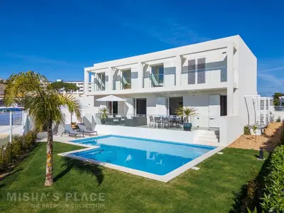 an image of a villa with a swimming pool at Villa Alba - Albufeira Premium by Misha's Place in Albufeira