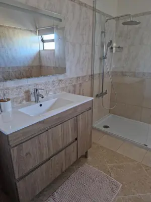 a bathroom with a sink and a shower at Holiday home in Albufeira in Albufeira