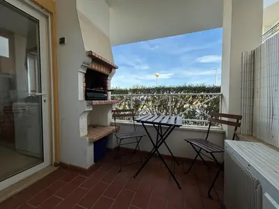 an aerial view of a house with a swimming pool at Alfamar e Falésia in Albufeira