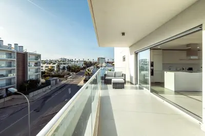 a view from the balcony of a house with a view at The Green Escape Albufeira Poolside Retreat in Albufeira
