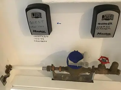 a fire hydrant in a bathroom with two meters at Old Town, Bay View Apartment in Albufeira