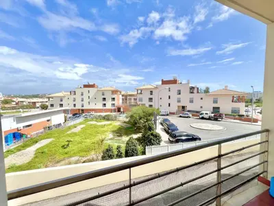 a brick building with a blue door on it at Albufeira Modern 6 With Pool by Homing in Albufeira