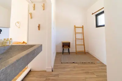 a room with a ladder and a stair case at Falésia Coast Villa by HelloVacations in Albufeira