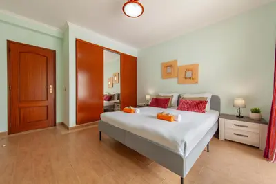 a living room with a couch and a fireplace at Villa Ocean by Algarve Vacation in Albufeira