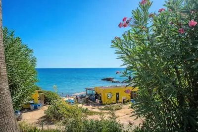 a group of mobile homes on the beach at Ocean Bliss - Panoramic Sea View - 20m to Beach - 2 Swimming Pools - Private Parking in Albufeira