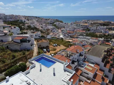 a view of a city from the roof of a house at Central Apartment by Ocvillas in Albufeira