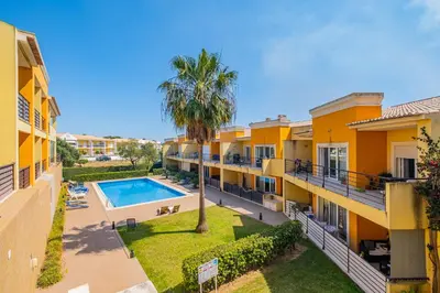 an aerial view of an apartment complex with a swimming pool at Vale Parra Village By Cabritatur in Guia