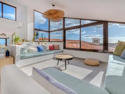 a living room with a couch and a table at Apartment Villa Magna by Interhome in Albufeira